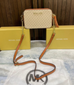 Michel Kor jet set logo crossbody bag with tossel